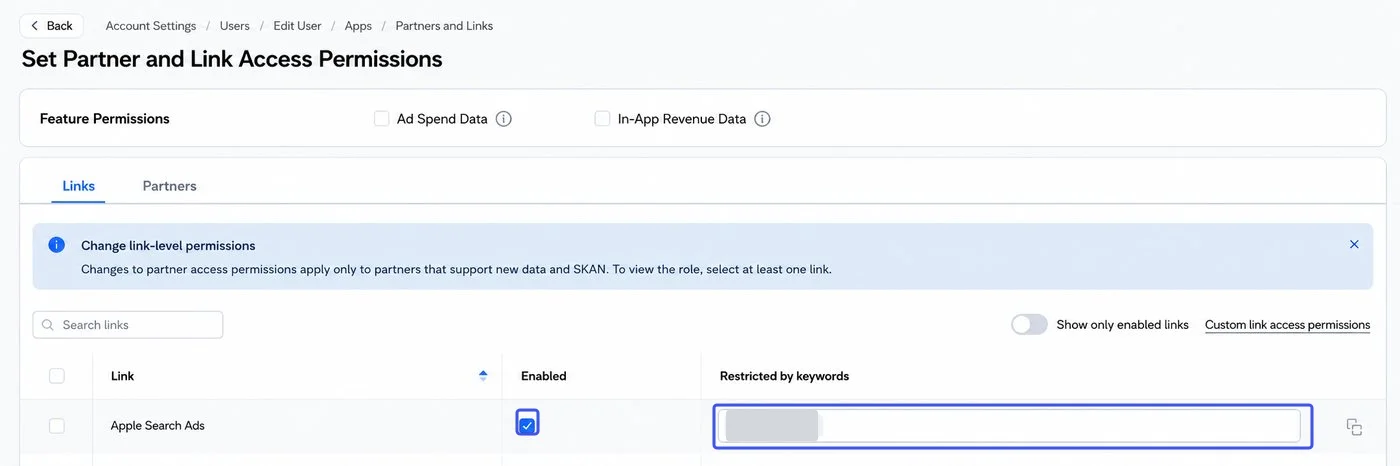 Adjust link access permissions with the Apple Search Ads link enabled and its masked Restricted by keywords field highlighted.